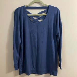 Athleta size L long sleeve blue shirt with criss cross back detailing
